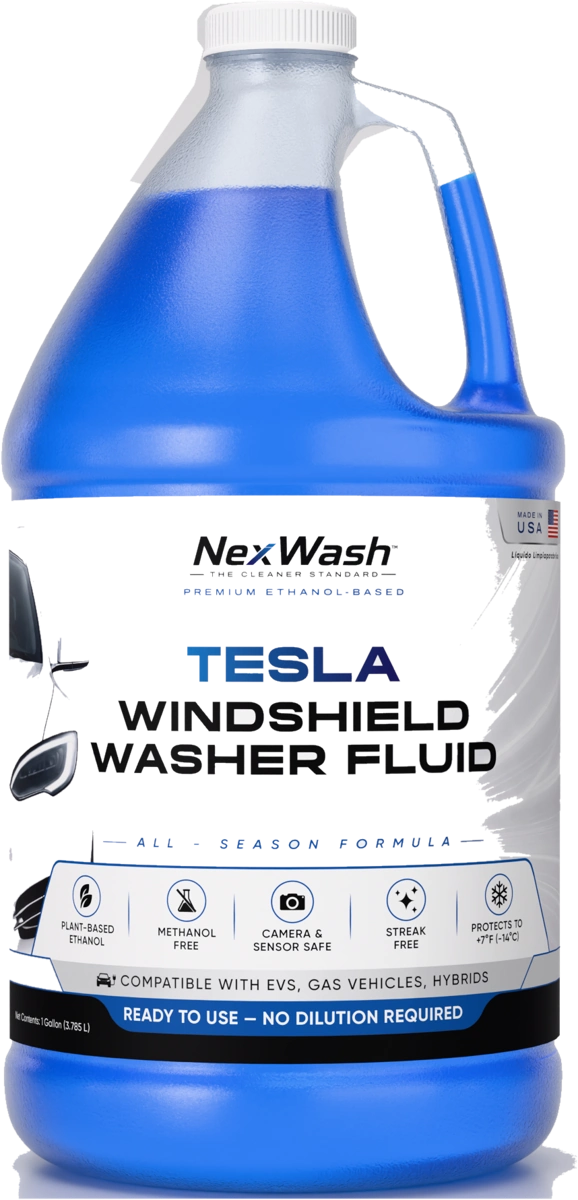 The original one-gallon NexWash bottle with its blue fluid, white handle and original label
